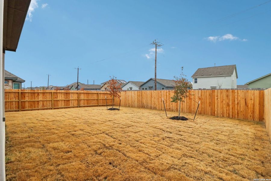 Exterior details and patio area of a home in Kallison Ranch, San Antonio (Image 25).