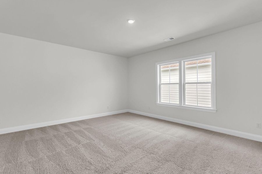 Spacious, unfurnished interior of a new home in Tidewater at Lakes of Cane Bay, Summerville (Image 23). Spacious, unfurnished interior of a new home in Tidewater at Lakes of Cane Bay, Summerville (Image 23).