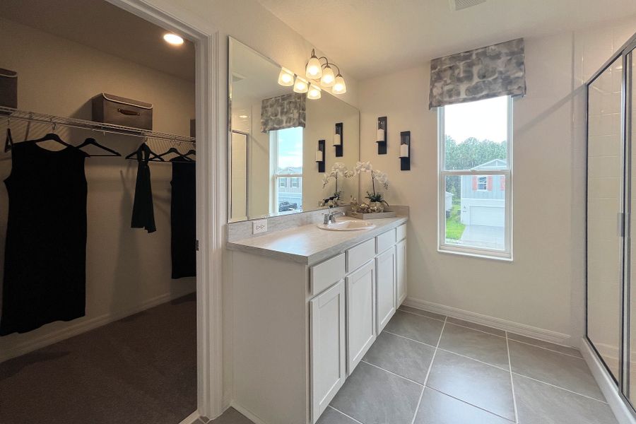 Ashley townhome model in Pine Meadows, Eustis FL — elegant two-story home with 4 bedrooms, 3 baths, and 1,898 sq. ft. of living space. Featuring an open-concept kitchen, dining, and living area, this modern townhome offers flexible layouts for families, guests, or a home office. Highlights include a spacious primary suite with private bath, second-floor laundry, covered lanai, and welcoming entry porch. Built with energy efficiency and stylish design, the Ashley townhome blends comfort, functionality, and charm in a sought-after Central Florida community.