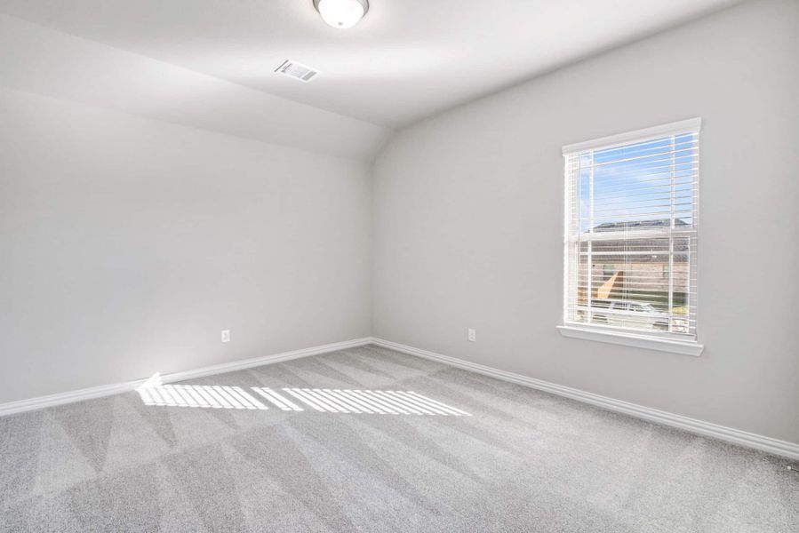 Representative unfurnished interior of a home built from the The Tulip by Lillian Custom Homes in The Preserve, Sherman (Image 19).