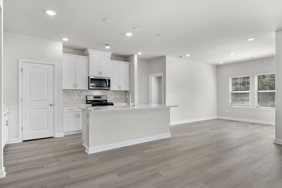 Furnished interior view inside a new home in Waterside - Coastline Series, Longs (Image 9).