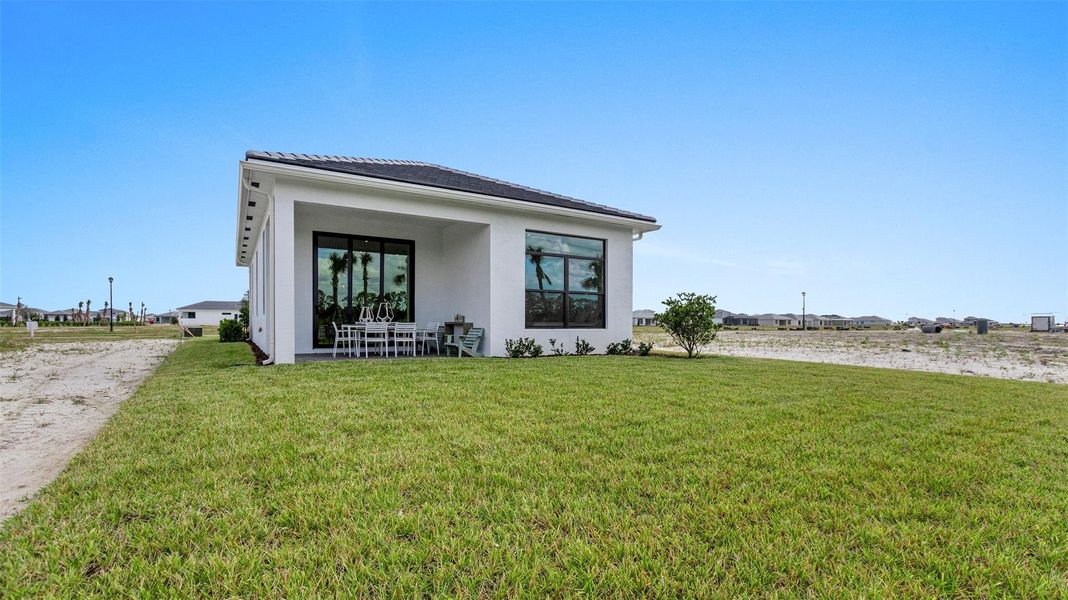 Exterior details and patio area of a home in PGA Village Verano, Port St. Lucie (Image 22). Exterior details and patio area of a home in PGA Village Verano, Port St. Lucie (Image 22).