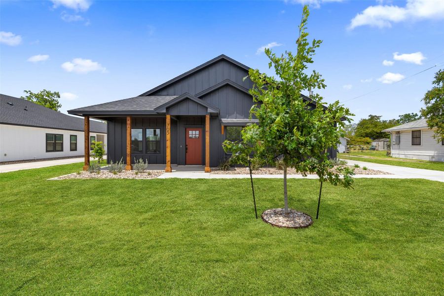 Front exterior of a new home in , Taylor, TX, highlighting curb appeal (Image 2). Front exterior of a new home in , Taylor, TX, highlighting curb appeal (Image 2).