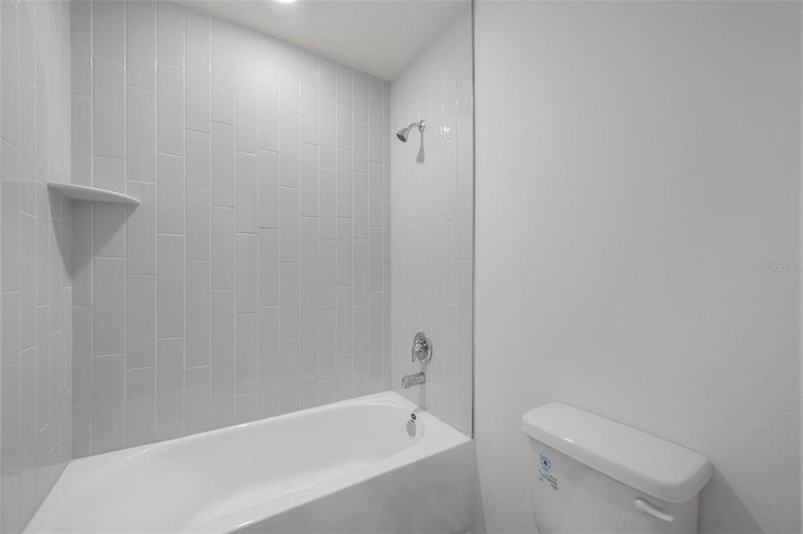 Furnished interior view inside a new home in Peach Crossings, Winter Haven (Image 10).