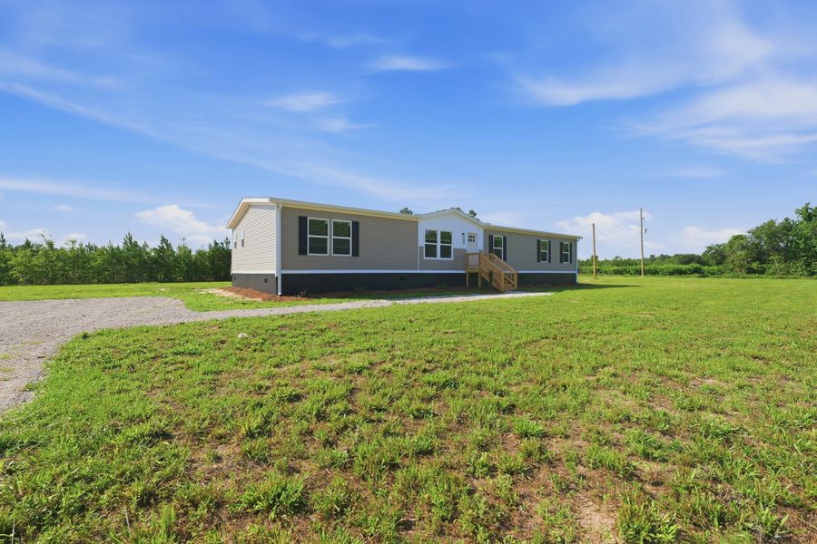 Exterior details and patio area of a home in , Cross (Image 23).