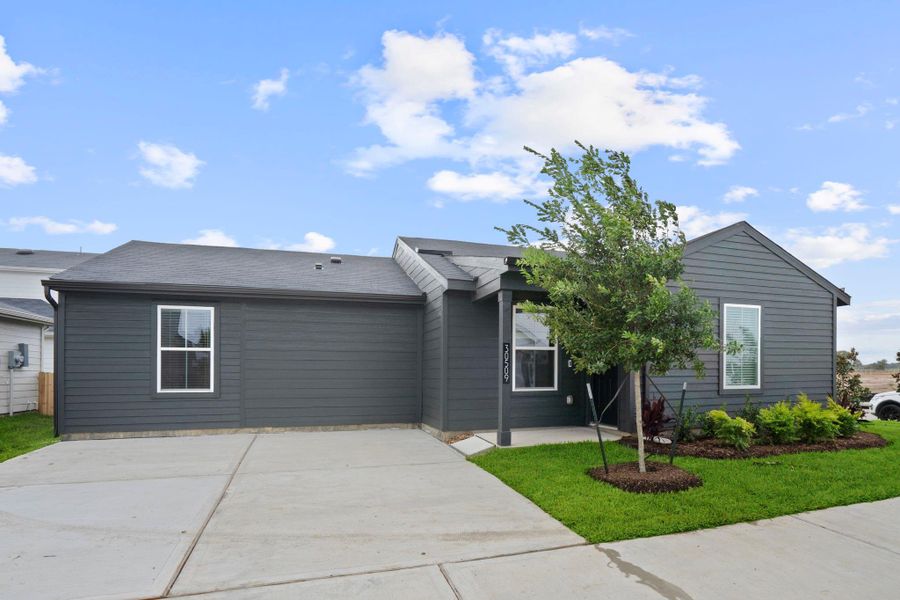 Front exterior of a new home in Stokesbury, Waller, TX, highlighting curb appeal (Image 15). Front exterior of a new home in Stokesbury, Waller, TX, highlighting curb appeal (Image 15).