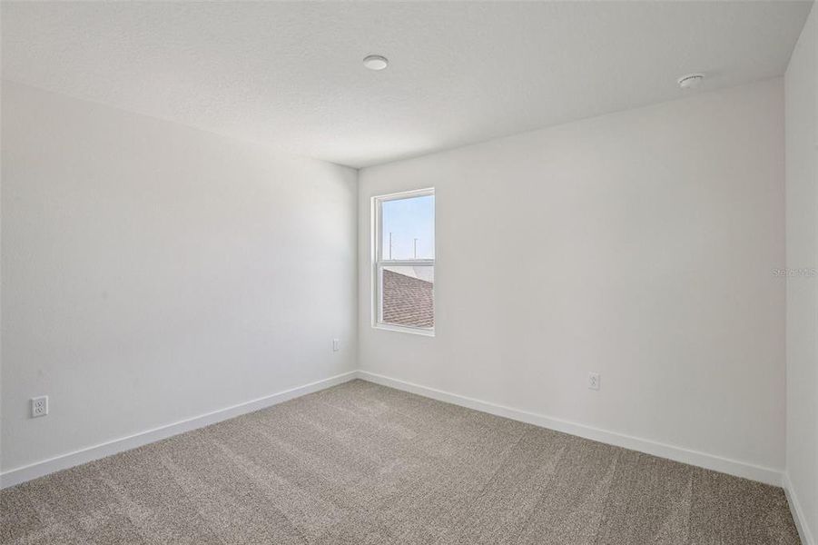 Spacious, unfurnished interior of a new home in Willowbrook North, Winter Haven (Image 30).