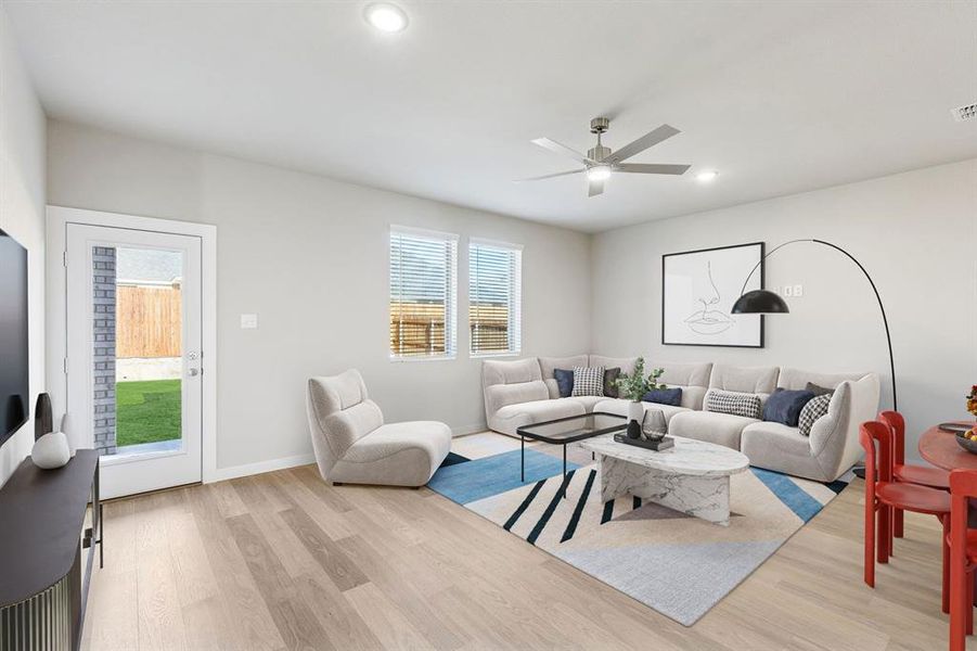 Living Room in the Haylee home plan by Trophy Signature Homes - REPRESENTATIVE PHOTO