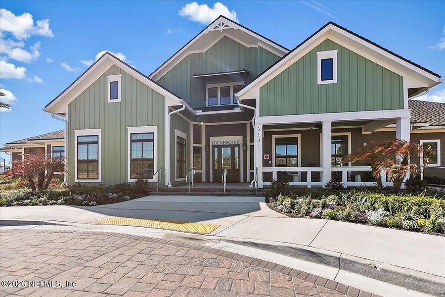 Front exterior of a new home in Edenbrooke at Hyland Trail | 55+, Green Cove Springs, FL, highlighting curb appeal (Image 2).
