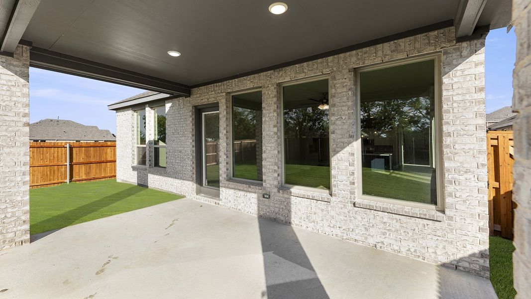 Exterior details and patio area of a home in Elevon 40s, Lavon (Image 3).