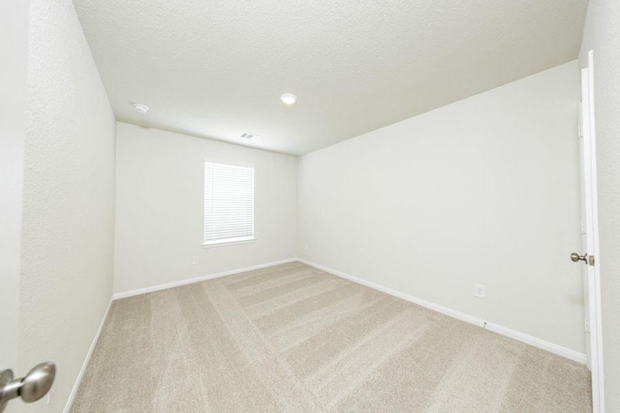 Spacious, unfurnished interior of a new home in River's Edge, Conroe (Image 15).