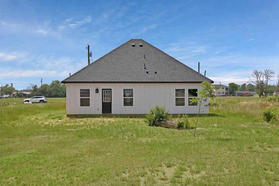 Front exterior of a new home in , Itasca, TX, highlighting curb appeal (Image 22). Front exterior of a new home in , Itasca, TX, highlighting curb appeal (Image 22).