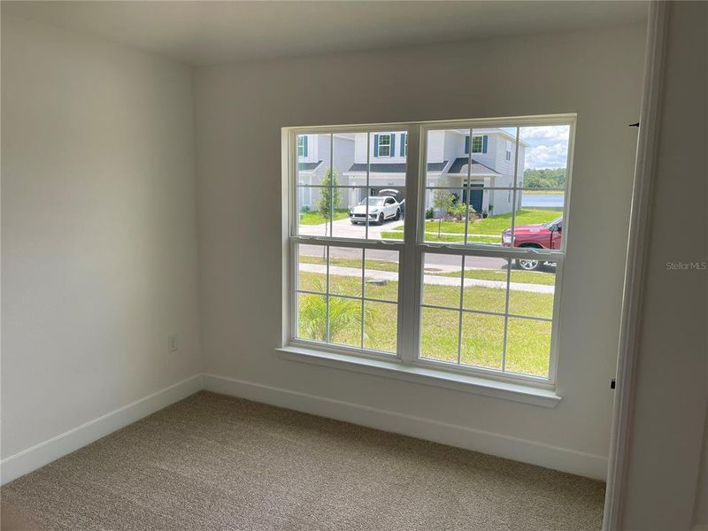 Spacious, unfurnished interior of a new home in Harmony Central, St. Cloud (Image 12).