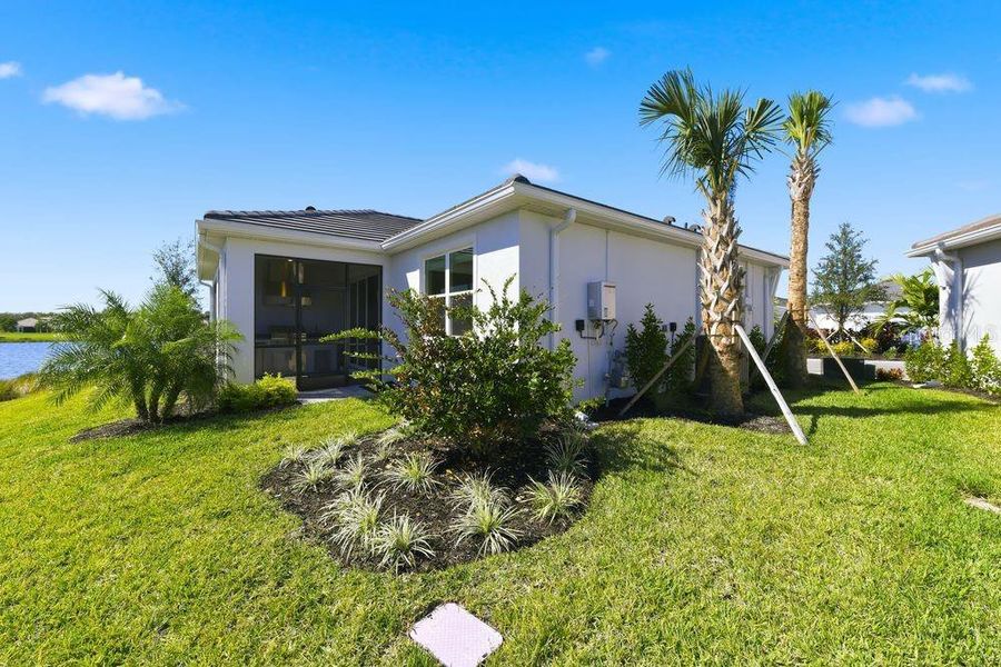 Exterior details and patio area of a home in Esplanade at Azario Lakewood Ranch, Lakewood Ranch (Image 3).