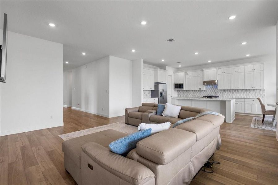 Spacious living room open to the kitchen for easy everyday living and gatherings. Spacious living room open to the kitchen for easy everyday living and gatherings.