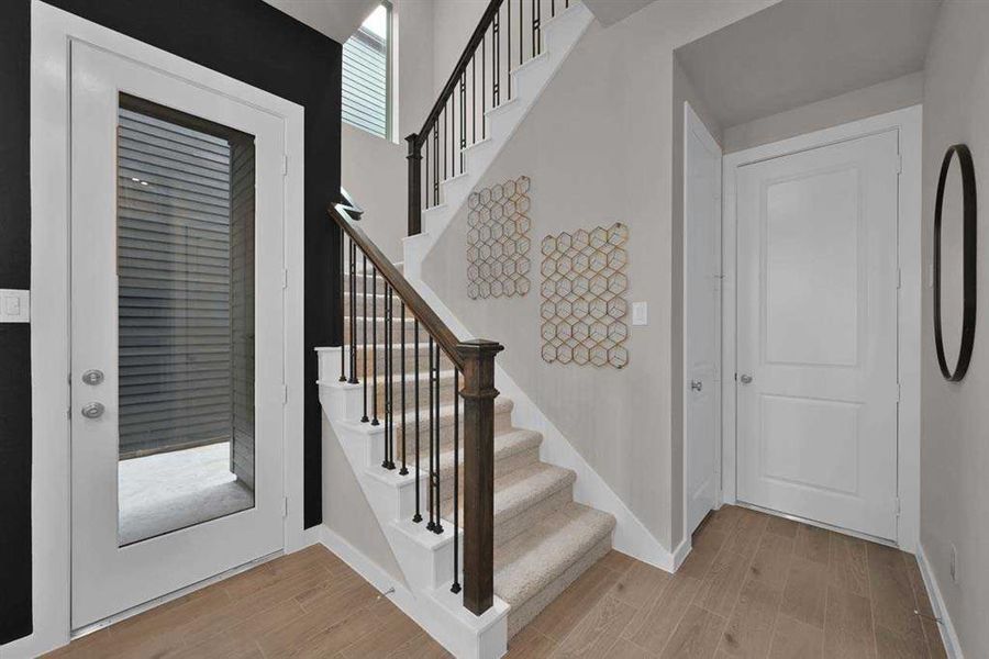 Doorway to outdoor living directly from dining/kitchen.
