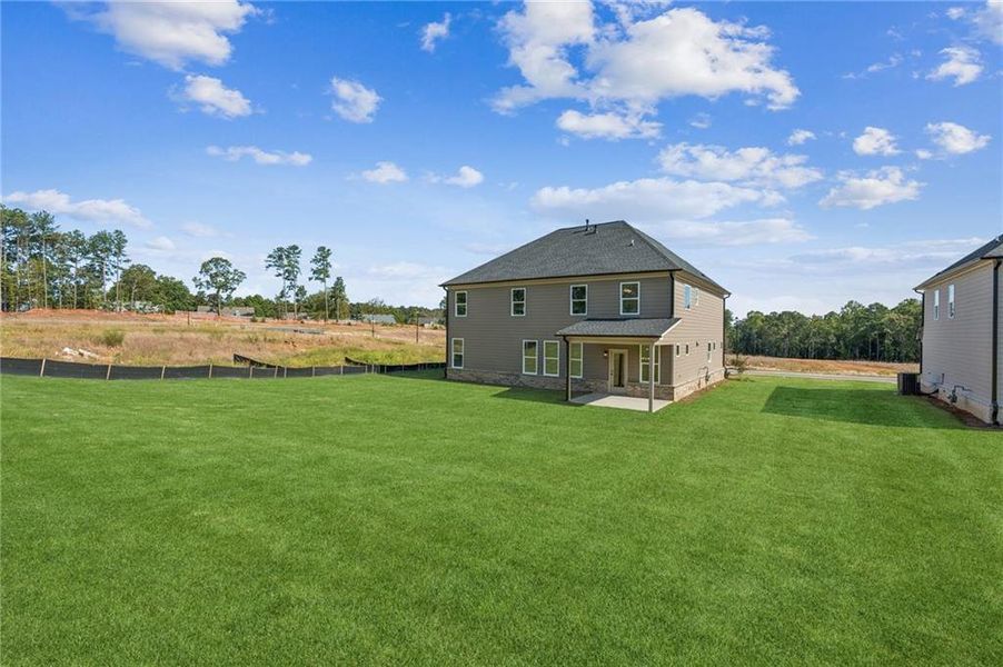 Front exterior of a new home in , Lawrenceville, GA, highlighting curb appeal (Image 23).