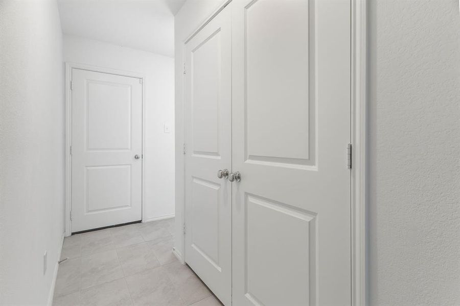 Passageway to Laundry Room and Garage