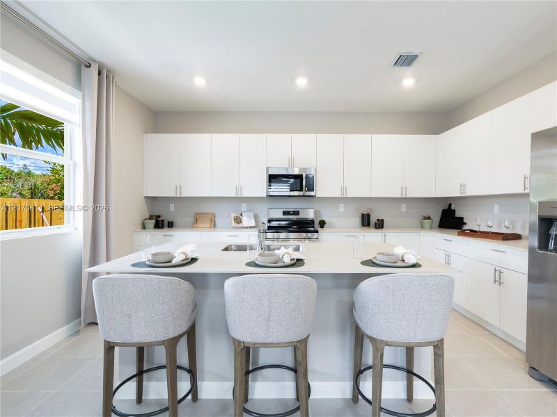 Furnished interior view inside a new home in Wildwood Groves, Miami (Image 31).