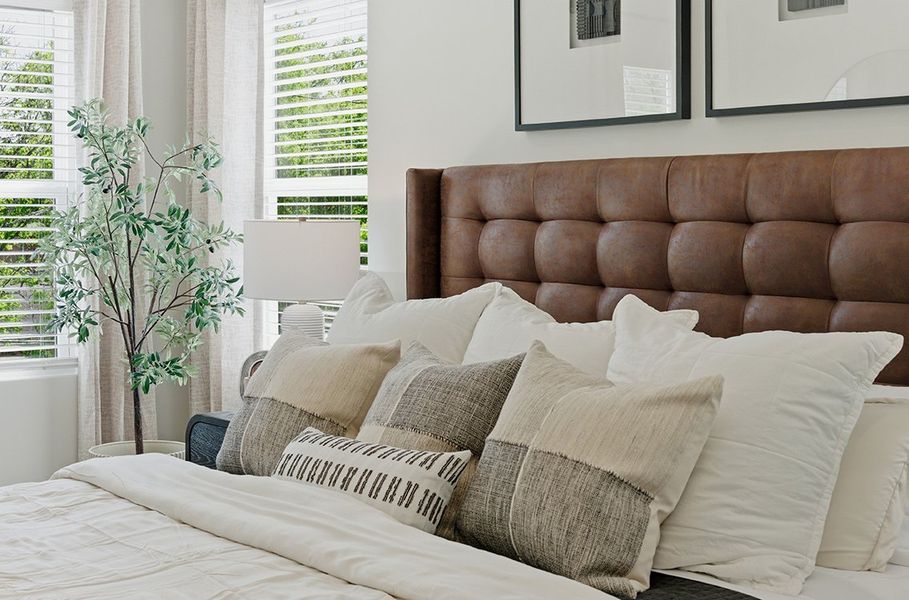 A couch with pillows.