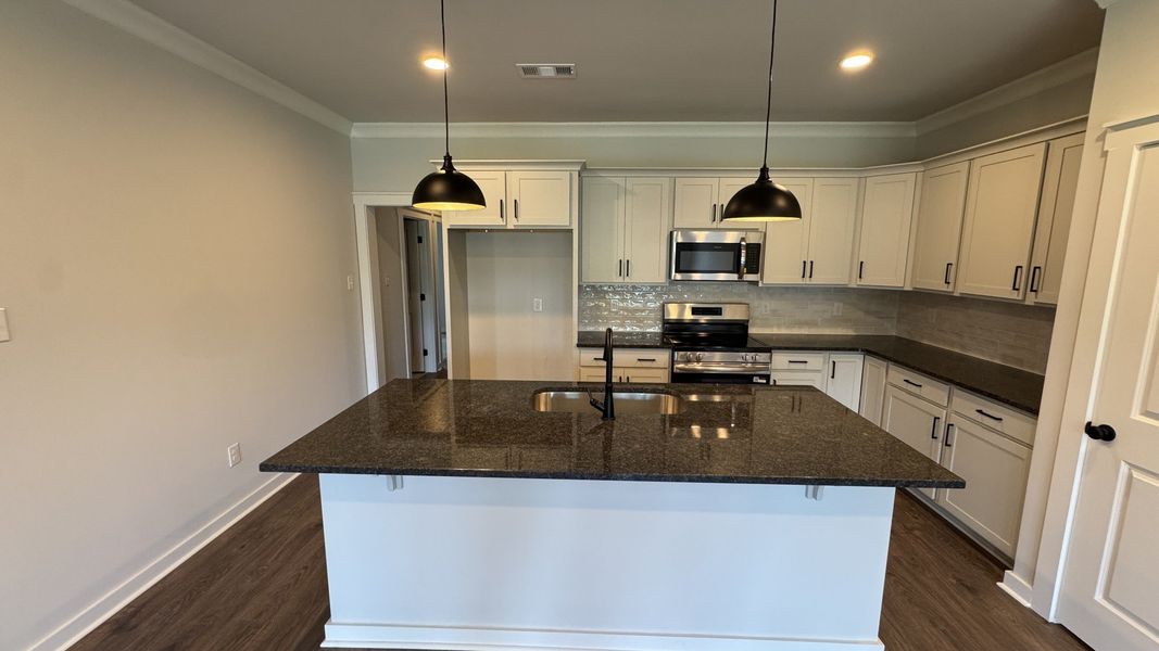 Furnished interior view inside a new home in The Greens at Legacy Townhomes, Springfield (Image 6).