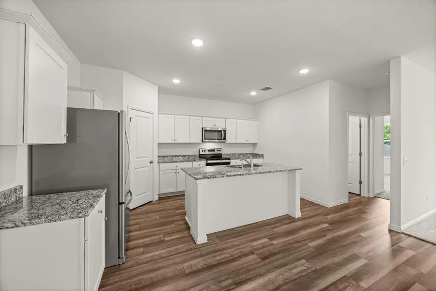 Furnished interior view inside a new home in Cottonwood Farms, Hutto (Image 7).