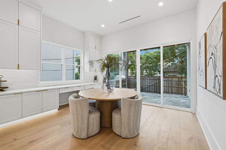 Seamless Indoor-Outdoor Transition: Large-scale sliding glass doors provide an effortless connection from the breakfast nook to the outdoor entertainment suite. This thoughtful design allows for an unbroken visual flow of the property’s premium finishes while making it easy to host gatherings that move naturally from the kitchen to the open air.