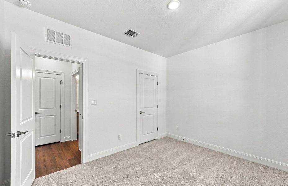 Spacious, unfurnished interior of a new home in Saddleback at Santa Rita Ranch, Liberty Hill (Image 40).