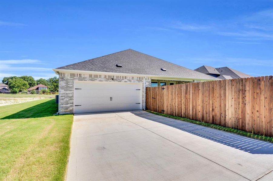 Front exterior of a new home in Ten Mile Creek Estates, DeSoto, TX, highlighting curb appeal (Image 17). Front exterior of a new home in Ten Mile Creek Estates, DeSoto, TX, highlighting curb appeal (Image 17).