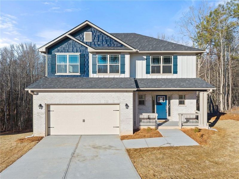Front exterior of a new home in Magnolia Villas, Cornelia, GA, highlighting curb appeal (Image 22).