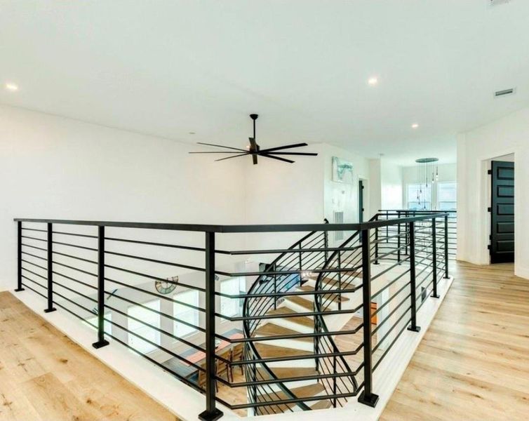 Upper level landing open to the main level living area