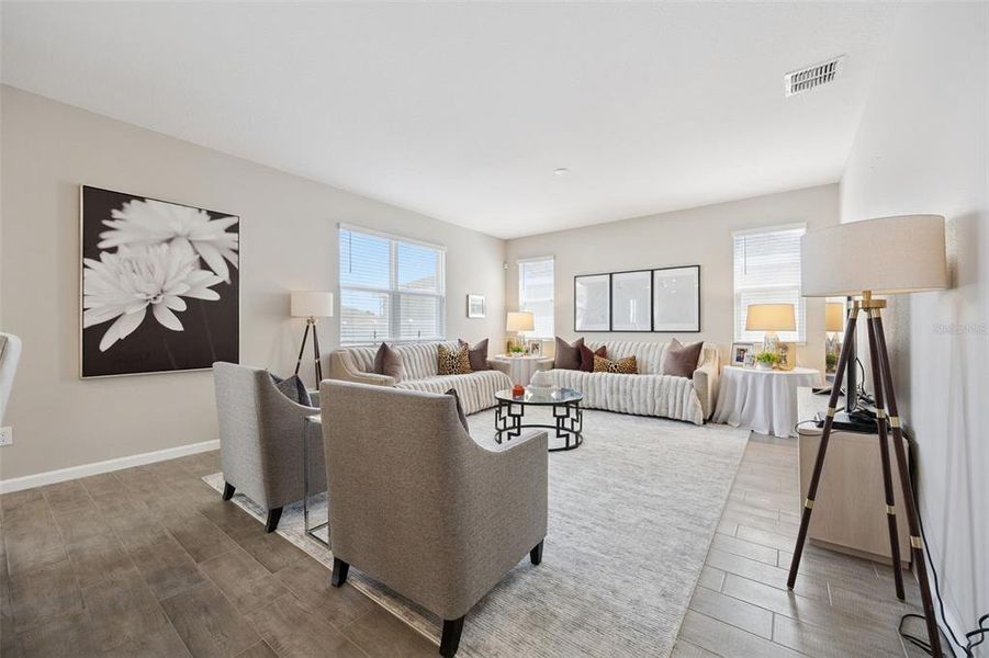 Furnished interior view inside a new home in Seasons at The Grove, Mascotte (Image 9).