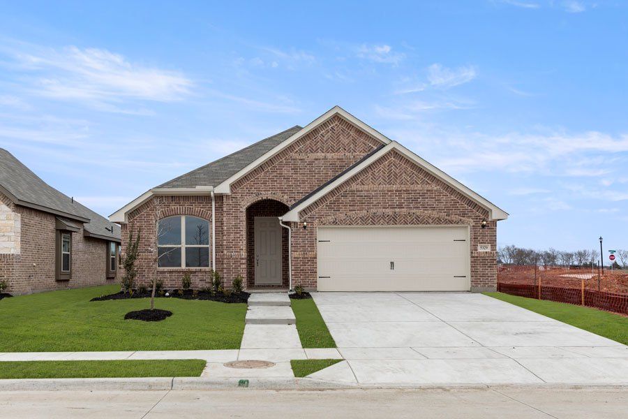Representative exterior photo of a completed home built from the Kingston by Impression Homes in Timberbrook, Justin, TX (Image 1).