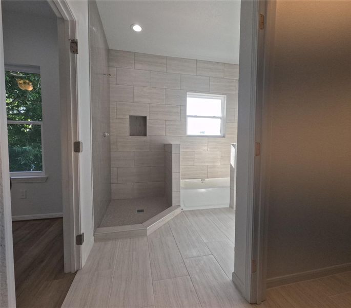 Primary Bathroom from walk-in closet