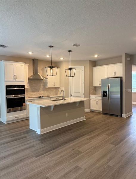 Furnished interior view inside a new home in Legends Preserve - Signature Series, Daytona Beach (Image 4).