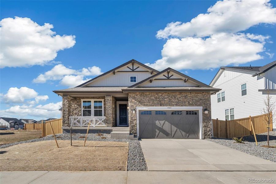 Front exterior of a new home in Windsong, Brighton, CO, highlighting curb appeal (Image 21). Front exterior of a new home in Windsong, Brighton, CO, highlighting curb appeal (Image 21).