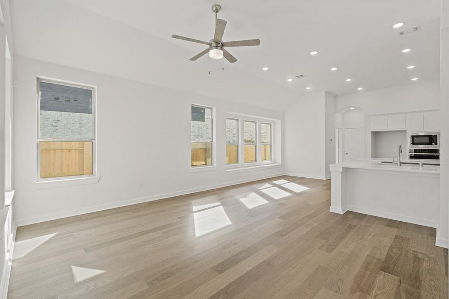 Spacious, unfurnished interior of a new home in Sunterra, Katy (Image 20).