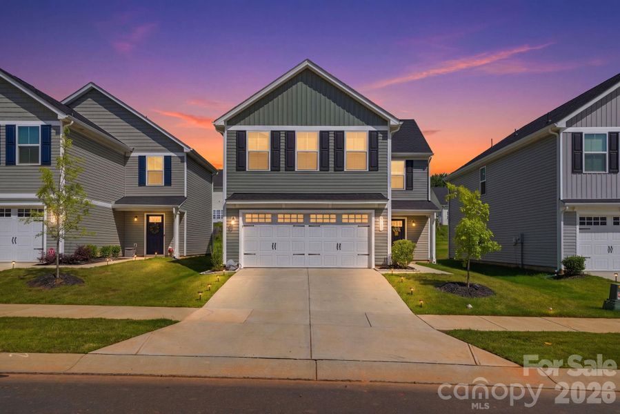 Front exterior of a new home in , Charlotte, NC, highlighting curb appeal (Image 23). Front exterior of a new home in , Charlotte, NC, highlighting curb appeal (Image 23).
