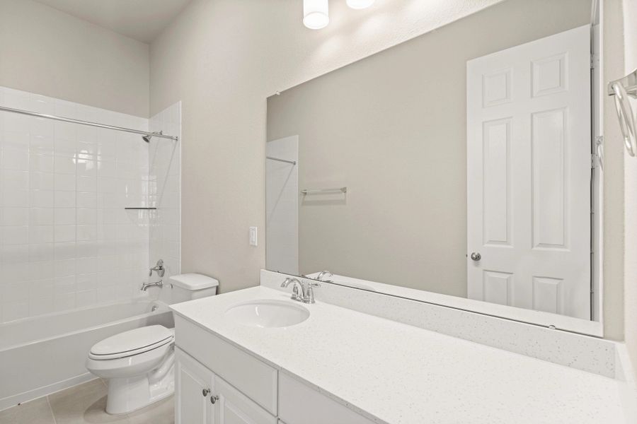 Furnished interior view inside a new home in Sunterra Lakes, Brookshire (Image 9).