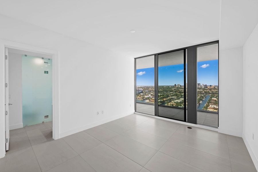 Primary bedroom with unobstructed Intracoastal and city view Primary bedroom with unobstructed Intracoastal and city view