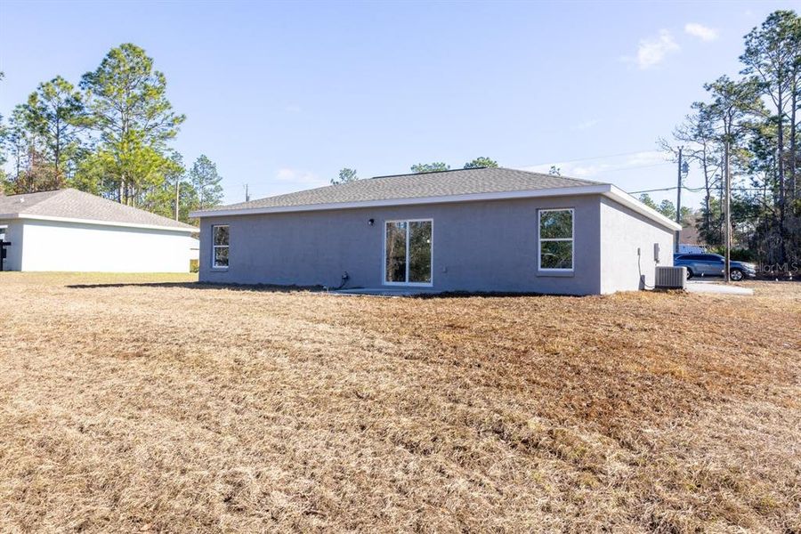 Exterior details and patio area of a home in , Citrus Springs (Image 14).