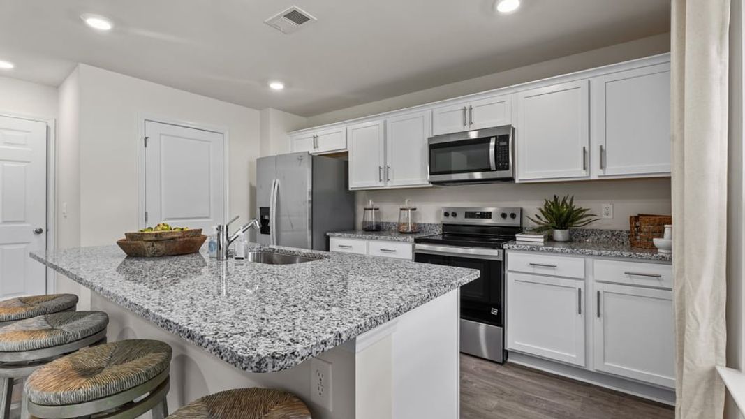 Representative furnished interior of a home built from the Belhaven by D.R. Horton in Foxtail, Yadkinville (Image 14).
