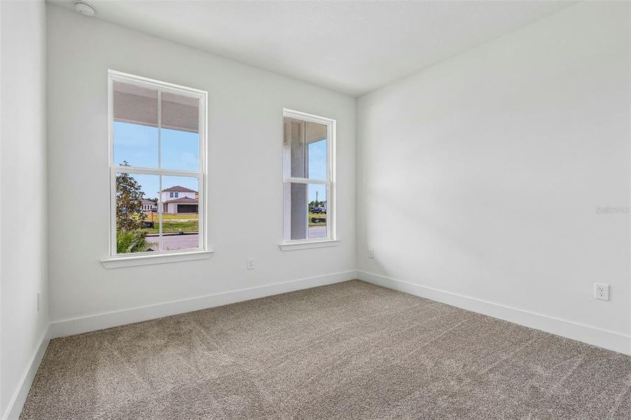Spacious, unfurnished interior of a new home in Lakeside at Satilla, St. Cloud (Image 17).