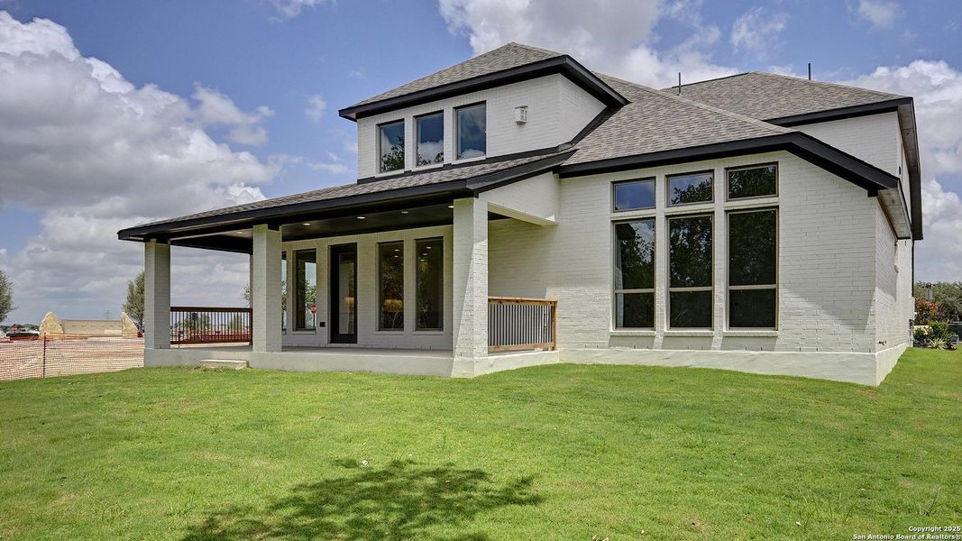 Front exterior of a new home in Esperanza 60', Boerne, TX, highlighting curb appeal (Image 23). Front exterior of a new home in Esperanza 60', Boerne, TX, highlighting curb appeal (Image 23).