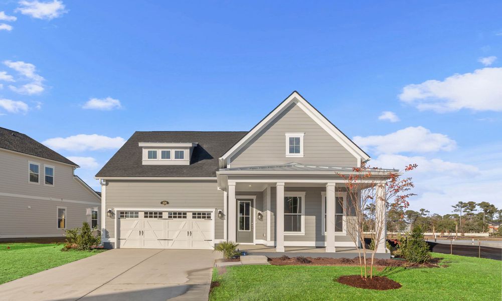 Front exterior of a new home in Beach View at Grande Dunes, Myrtle Beach, SC, highlighting curb appeal (Image 1). Front exterior of a new home in Beach View at Grande Dunes, Myrtle Beach, SC, highlighting curb appeal (Image 1).