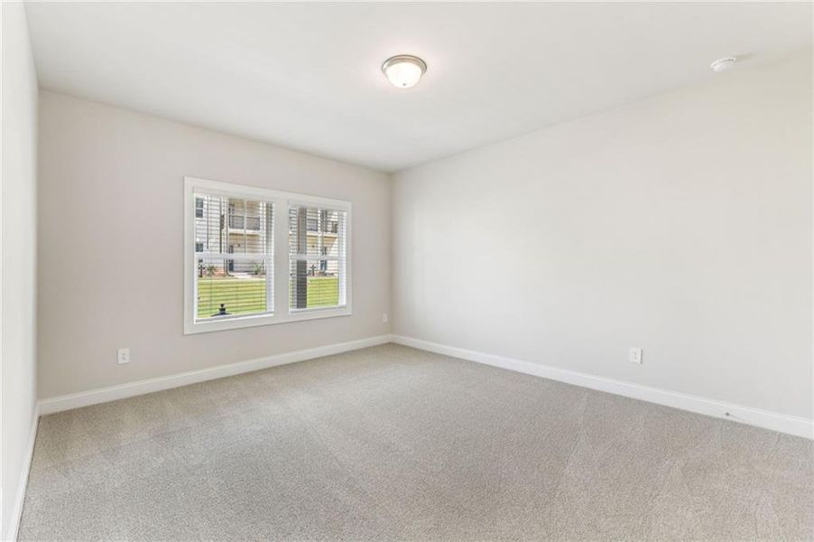 Spacious, unfurnished interior of a new home in Martin Springs - Highland Series, Lawrenceville (Image 41).
