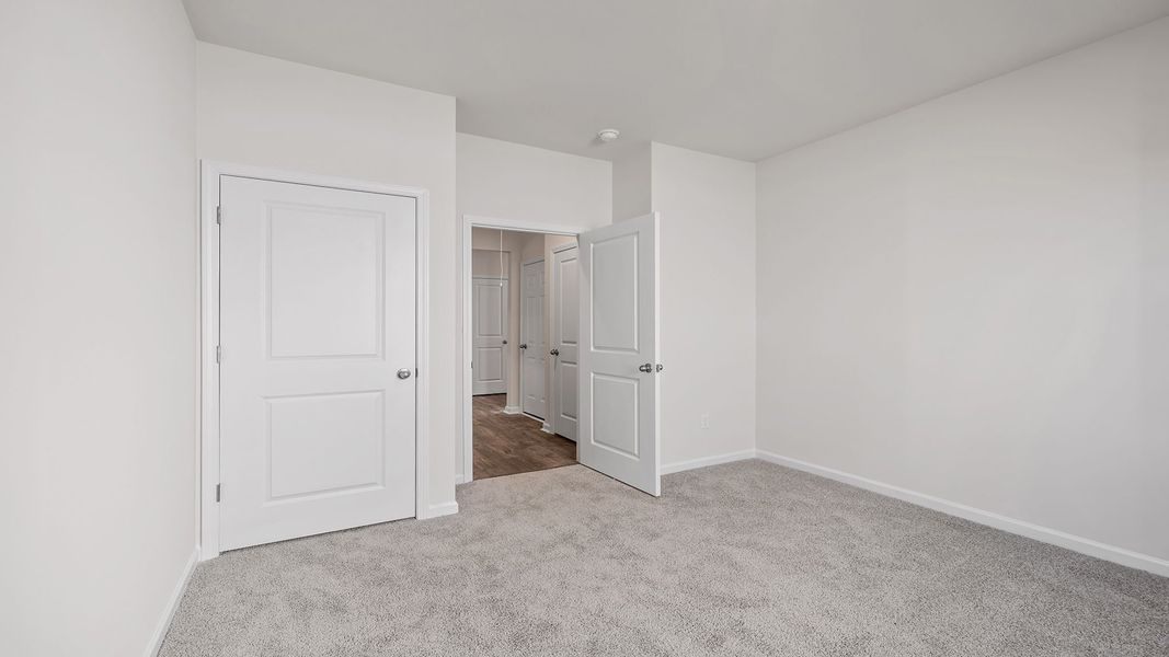 Spacious, unfurnished interior of a new home in Durbin Meadows Traditions, Fountain Inn (Image 22).