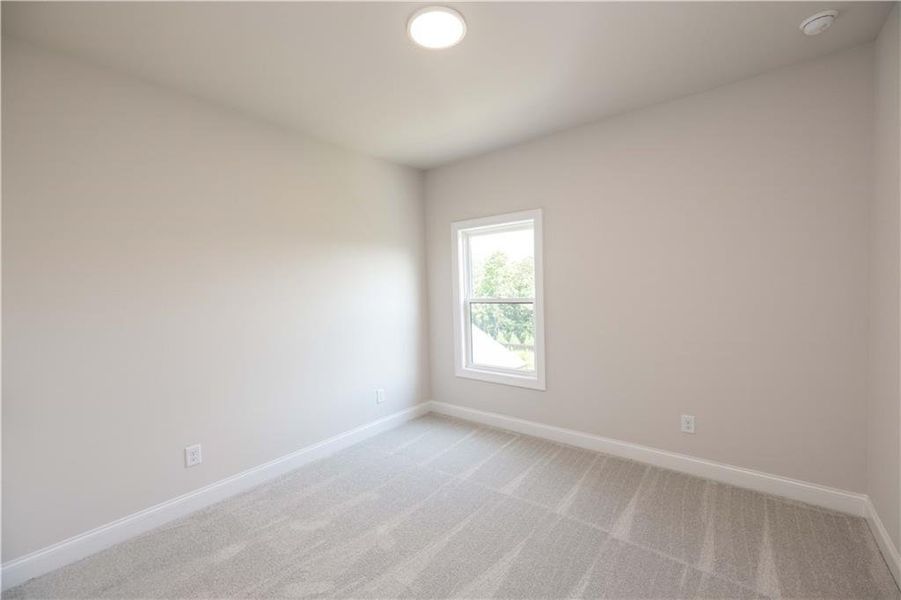 Spacious, unfurnished interior of a new home in Waterhaven, Cumming (Image 30).