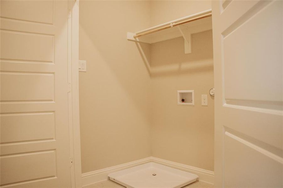 Laundry room featuring hookup for a gas dryer and hookup for a washing machine