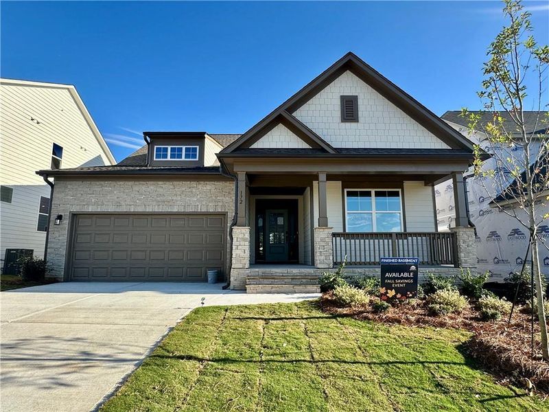 Exterior details and patio area of a home in Twin Lakes, Hoschton (Image 1).